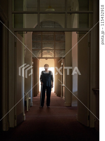 Smile, walking stick and portrait of old woman in home of living room in retirement in dark hallway. Fashion, senior and happy elderly female person with disability for confidence on cane to relax Smile, walking stick and portrait of old woman in home of living room in retirement in dark hallway. Fashion, senior and happy elderly female person with disability for confidence on cane to relax 115432918
