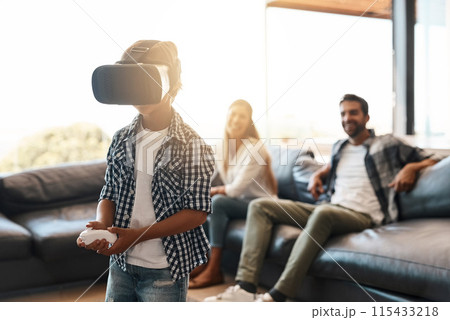 Family, child and virtual reality headset in home for cyber experience, metaverse system or gaming connection. Gamer parents, boy and VR games in living room with future, innovation and ui technology Family, child and virtual reality headset in home for cyber experience, metaverse system or gaming connection. Gamer parents, boy and VR games in living room with future, innovation and ui technology 115433218
