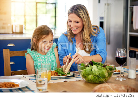 Happy, food or mother and daughter in a house for lunch, conversation and bonding with organic meal. Salad, brunch or family at home with health, diet and nutrition on vacation, event or weekend 115435258