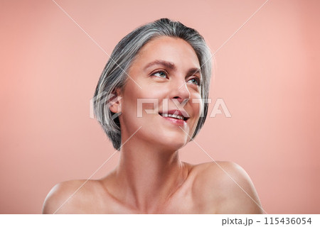 Skincare, anti aging and mature woman thinking in studio for cosmetology, dermatology or natural glow on pink background. Wellness, beauty and female person for facial, spa treatment or cosmetics 115436054