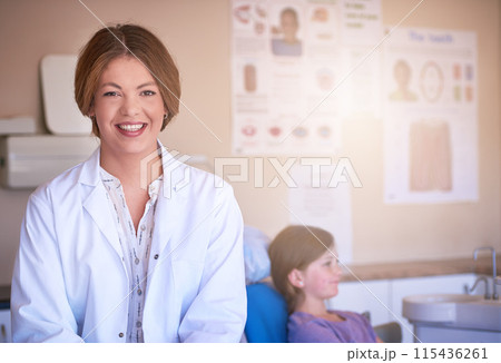 Healthcare, dentist and portrait of woman with patient for dental care, medical service and pride. Clinic, smile and face of person with girl for oral hygiene, consultation and tooth extraction 115436261