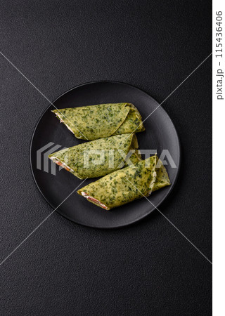 Delicious homemade pancakes with spinach, salmon, Philadelphia cheese 115436406
