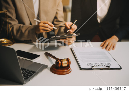 Lawyer, legal advisor, businessman brainstorming information on agreement details Business contracts in legal processing books for accuracy in contract documents. joint financial investment. Lawyer, legal advisor, businessman brainstorming information on agreement details Business contracts in legal processing books for accuracy in contract documents. joint financial investment. 115436547