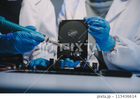 Close up of Technician measuring voltage electronic circuit board television, Service after sale fix electric equipment within insurance. 115436614