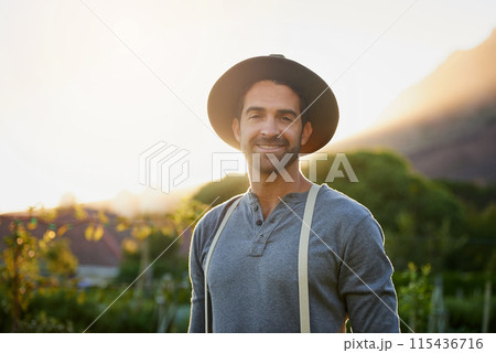 Garden, man and farmer portrait with agriculture, sustainability and eco farming work in the countryside. Smile, nature and field with plants, vegetables and outdoor with gardening and green project 115436716