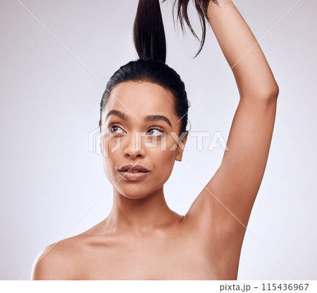 Thinking, hair care and woman in studio with cosmetics, keratin treatment and growth on white background. Extensions, female person and conditioner with hairstyle for grooming, cleanliness or routine Thinking, hair care and woman in studio with cosmetics, keratin treatment and growth on white background. Extensions, female person and conditioner with hairstyle for grooming, cleanliness or routine 115436967