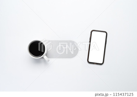 A cup of coffee with switch buttons and mobile phone isolated on white background. Get energy and Morning motivation A cup of coffee with switch buttons and mobile phone isolated on white background. Get energy and Morning motivation 115437125