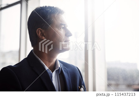 Business man, thinking and window for confidence, vision and determination in professional career as lawyer. Serious, male person or attorney with idea, choice or decision for legal advice in office 115437213