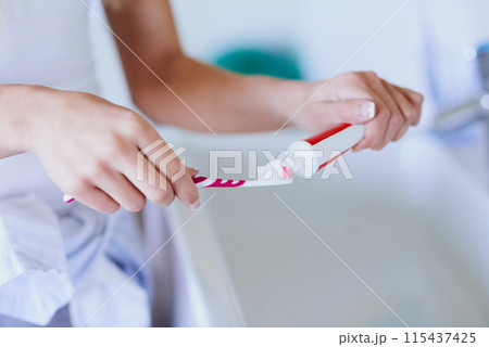 Dental care, toothbrush and toothpaste for mouth, hands and oral hygiene for fresh breath. Selfcare, grooming and morning routine for person in bathroom, cosmetic and wellness for teeth and home Dental care, toothbrush and toothpaste for mouth, hands and oral hygiene for fresh breath. Selfcare, grooming and morning routine for person in bathroom, cosmetic and wellness for teeth and home 115437425