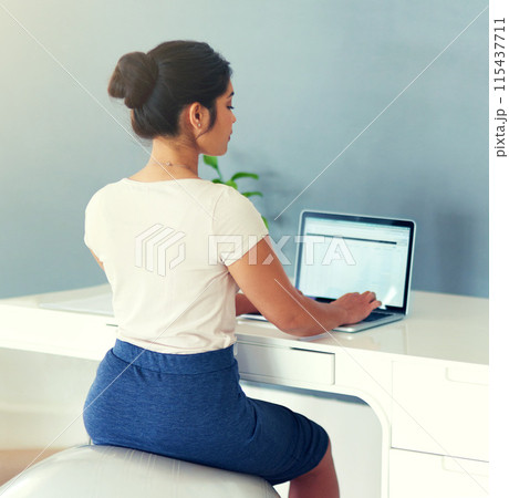 Woman, laptop and freelancer on yoga ball for proposal, planning and employee in home office. Female person, back and professional for project management, online and website for research or posture Woman, laptop and freelancer on yoga ball for proposal, planning and employee in home office. Female person, back and professional for project management, online and website for research or posture 115437711