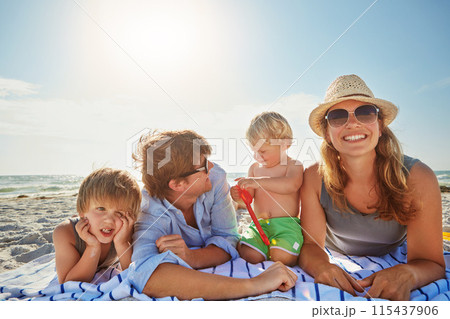Portrait, relax or kids with parents at sea on holiday vacation or happy family weekend together. Father, fun mother or children siblings at beach for bonding or playing in nature in Spain with love Portrait, relax or kids with parents at sea on holiday vacation or happy family weekend together. Father, fun mother or children siblings at beach for bonding or playing in nature in Spain with love 115437906