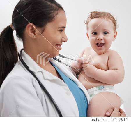 Happy, portrait and baby in clinic with stethoscope, doctor and healthcare for wellness. Woman, child and consulting in medical office for development, growth and young patient with smile for results 115437914