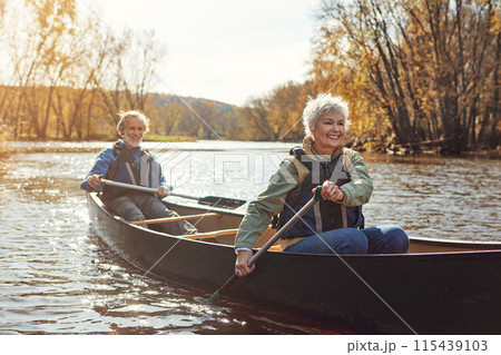 Lake, rowing and kayak with senior couple, relax and retirement with happiness, weekend break and vacation. Outdoor, river and mature man with old woman, support and trust with holiday and nature 115439103
