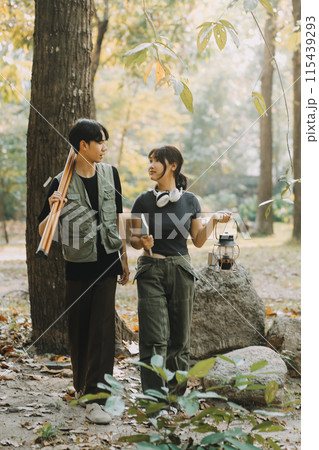 Asian couple sweet in tent inside on they camping trip, traveller relax and sleep togather in out door and camping trip Asian couple sweet in tent inside on they camping trip, traveller relax and sleep togather in out door and camping trip 115439293