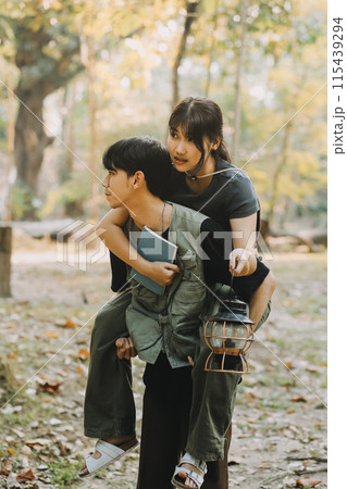 Asian couple sweet in tent inside on they camping trip, traveller relax and sleep togather in out door and camping trip 115439294