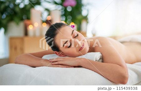 Body, massage and sleeping with woman in spa to relax or rest for health, peace and wellness. Beauty, calm and stress free with face client on bed in clinic or salon for natural skincare treatment 115439338