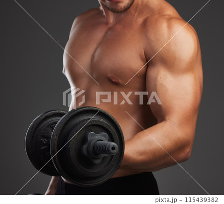 Dumbbells, bicep and bodybuilder in studio for exercise, training and fitness for health. Sportsman, athlete and shirtless for weight lifting by dark background for transformation, workout and arm 115439382
