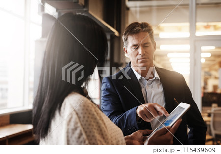 Partnership, people and explain in office with tablet for teamwork, collaboration and discussion on company growth. Boss, accountant and conversation for feedback, report and financial statistics 115439609