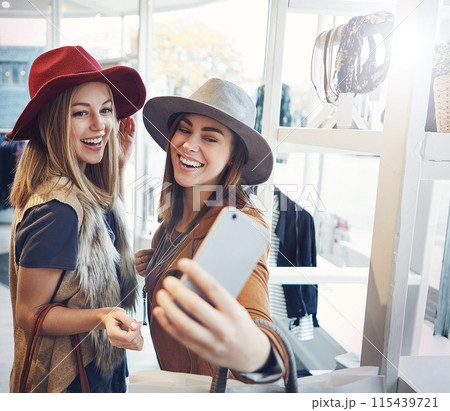 Friends, selfie and retail date with women, smile and happiness together with shopping, sale and discount at mall. Fashion, photograph and memory for social media, customer and urban boutique shop 115439721
