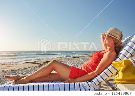 Woman, smile and relax on chair at beach for tropical island, vacation and outdoor holiday in summer. Female person, hat and happy with sunglasses by ocean for sunshine, travel and tourism in Bali Woman, smile and relax on chair at beach for tropical island, vacation and outdoor holiday in summer. Female person, hat and happy with sunglasses by ocean for sunshine, travel and tourism in Bali 115439967