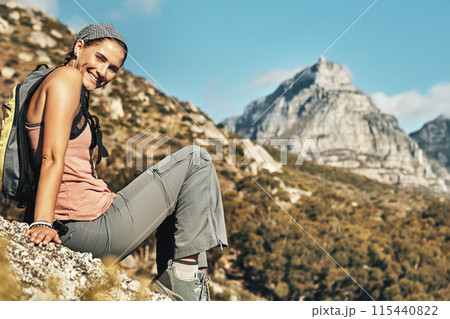 Portrait, hiking and woman with nature, smile and outdoor for adventure, mountain and journey. Happy person, hiker and healthy girl with environment, break or cardio with vacation, wellness and hobby 115440822