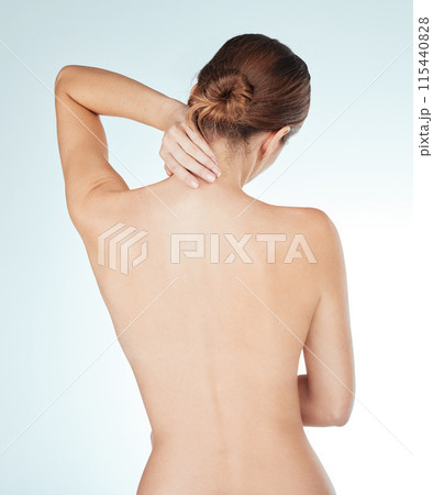 Neck pain, body and naked woman in studio with injury, discomfort and inflammation, nerve or problem on white background. Back, emergency and nude girl model with tender, spine or wound risk crisis Neck pain, body and naked woman in studio with injury, discomfort and inflammation, nerve or problem on white background. Back, emergency and nude girl model with tender, spine or wound risk crisis 115440828