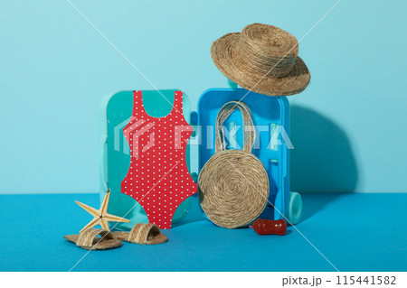 Concept of summer vacation, suitcase and other accessories. 115441582