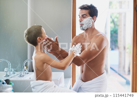 Shaving cream, learning and child with father in bathroom for hygiene, grooming and health routine. Bonding, hair removal and man teaching facial epilation treatment to boy kid for self care at home. 115441749