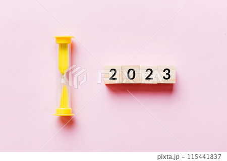 New Year 2023 sand timer. Resolution, time, plan, goal, motivation, reboot, countdown and New Year holiday concepts. Hourglass with number 2023 New Year 2023 sand timer. Resolution, time, plan, goal, motivation, reboot, countdown and New Year holiday concepts. Hourglass with number 2023 115441837