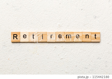 retirement word written on wood block. retirement text on cement table for your desing, concept retirement word written on wood block. retirement text on cement table for your desing, concept 115442180
