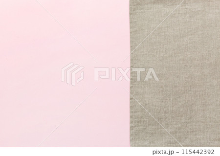 top view with gray kitchen napkin isolated on table background. Folded cloth for mockup with copy space, Flat lay. Minimal style top view with gray kitchen napkin isolated on table background. Folded cloth for mockup with copy space, Flat lay. Minimal style 115442392