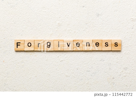 forgiveness word written on wood block. forgiveness text on table, concept forgiveness word written on wood block. forgiveness text on table, concept 115442772