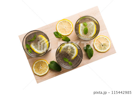 Healthy breakfast or morning with chia seeds lemon and mint on table background, vegetarian food, diet and health concept. Chia pudding with lemon and mint Healthy breakfast or morning with chia seeds lemon and mint on table background, vegetarian food, diet and health concept. Chia pudding with lemon and mint 115442985
