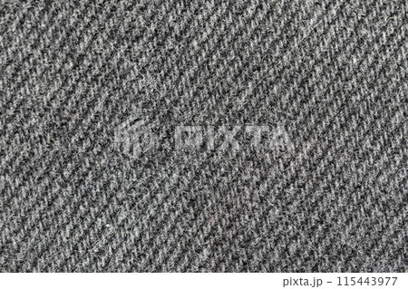 Black and grey denim background. Detailed texture of black and grey denim fabric. 115443977