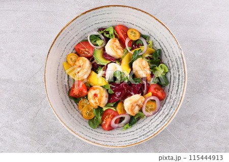 Shrimp, Avocado, Tomato Salad. Grilled View from above, top studio shot Shrimp, Avocado, Tomato Salad. Grilled View from above, top studio shot 115444913