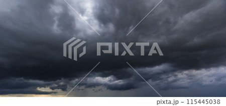 The dark sky with heavy clouds converging and a violent storm before the rain.Bad or moody weather sky and environment. carbon dioxide emissions, greenhouse effect, global warming, climate change. The dark sky with heavy clouds converging and a violent storm before the rain.Bad or moody weather sky and environment. carbon dioxide emissions, greenhouse effect, global warming, climate change. 115445038