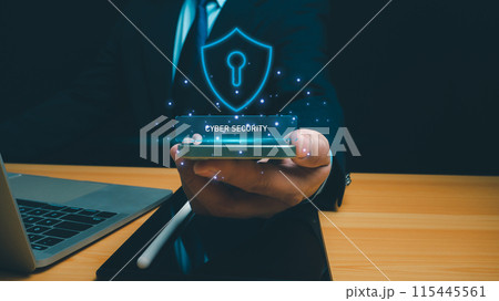 Cyber security technology concept, Businessman use phone and computer online showing protection icons cyber espionage, Represents the code protection, Security concept and communication technology. 115445561