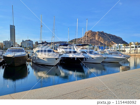 Boats in Alicante marina with castle behind 115448092