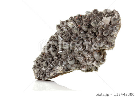 Macro of a stone Ilvaite mineral on a white background 115448300