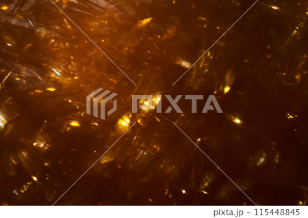 Festive dark gold abstract background with sparkles. Festive dark gold abstract background with sparkles. 115448845