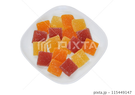 Marmalade in a plate isolated on white background. Sweet colorful dessert in plate for the holiday. Top view. 115449147