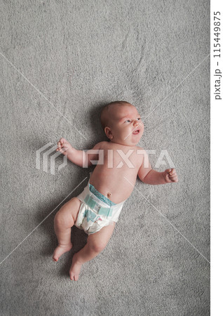 Newborn baby 2 months old with atopic dermatitis close up portrait. Baby care, colic, teething, crying. Newborn baby 2 months old with atopic dermatitis close up portrait. Baby care, colic, teething, crying. 115449875