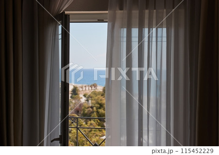 Apartment with sea view, open balcony door Apartment with sea view, open balcony door 115452229
