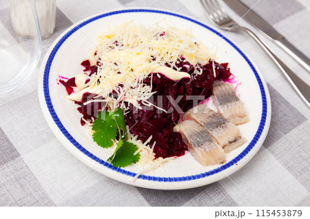 Beetroot served with cheese and pickled mackerel 115453879