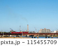 電車と煙突と河川敷 115455709