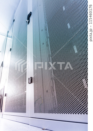 Data center with a row of server racks Data center with a row of server racks 115460176