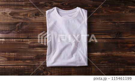 a colored blank t-shirt is folded neatly, ironed, placed in the frame for mockup 115461199