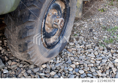 View of an old truck flat tyre. 115463079