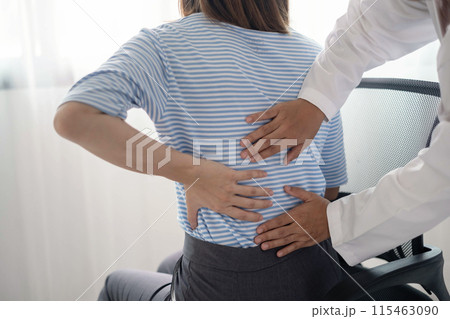 Female physiotherapists provide physical assistance to women patients with back injuries back massages for relaxation and muscle recovery in the rehabilitation center Female physiotherapists provide physical assistance to women patients with back injuries back massages for relaxation and muscle recovery in the rehabilitation center 115463090