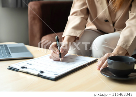 Business woman employer holding resume hiring recruit looking cv resume to hire candidates, analyzing information before job interview. Recruitment concepts Business woman employer holding resume hiring recruit looking cv resume to hire candidates, analyzing information before job interview. Recruitment concepts 115463345